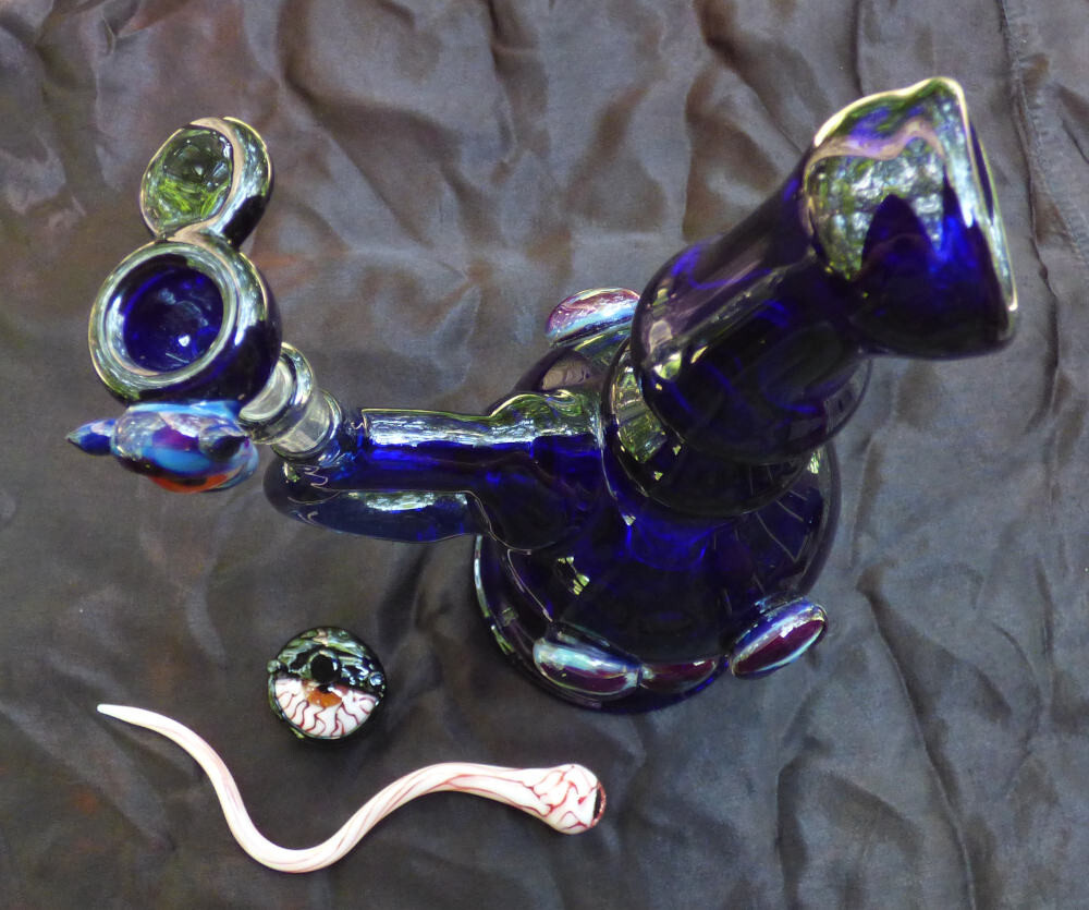 Handblown glass eye bong set. Includes eye cap and eye tool. A unique piece.